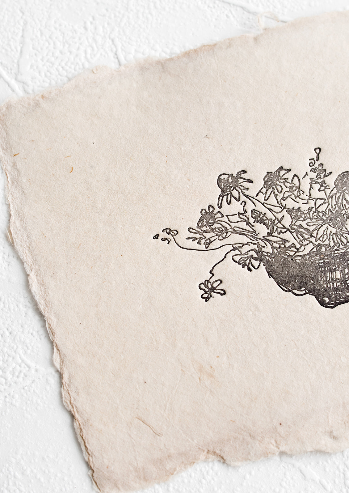 A small letterpress art print on naturally dyed paper with deckled edges.