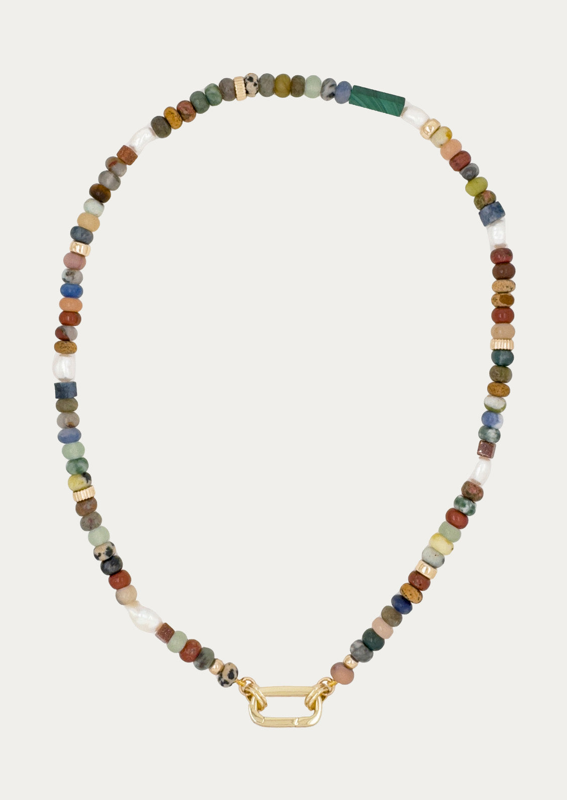 A gold carabiner necklace adorned with various colored gemstones in muted tones.