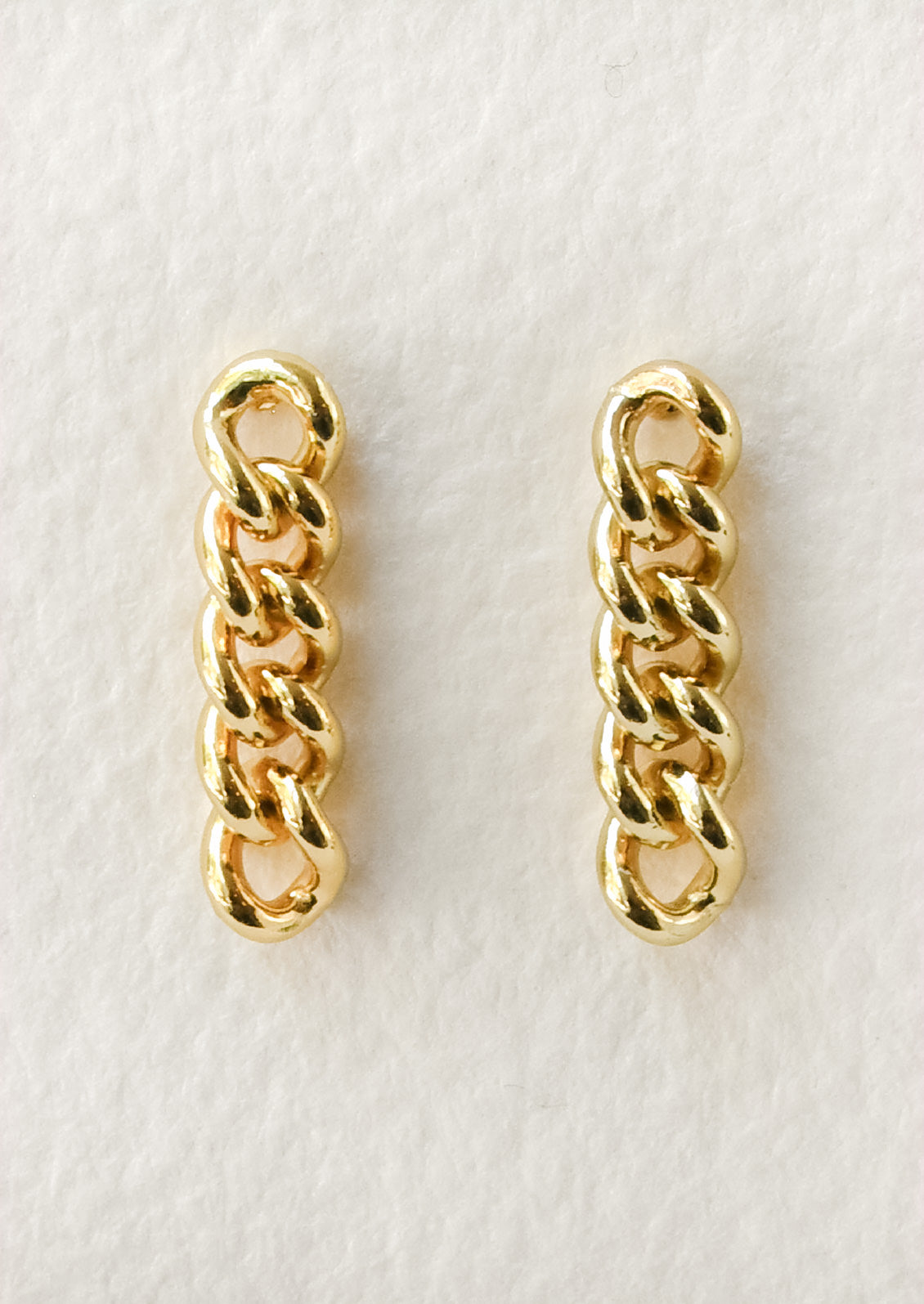 A pair of gold studs with a dangling chainlink design.