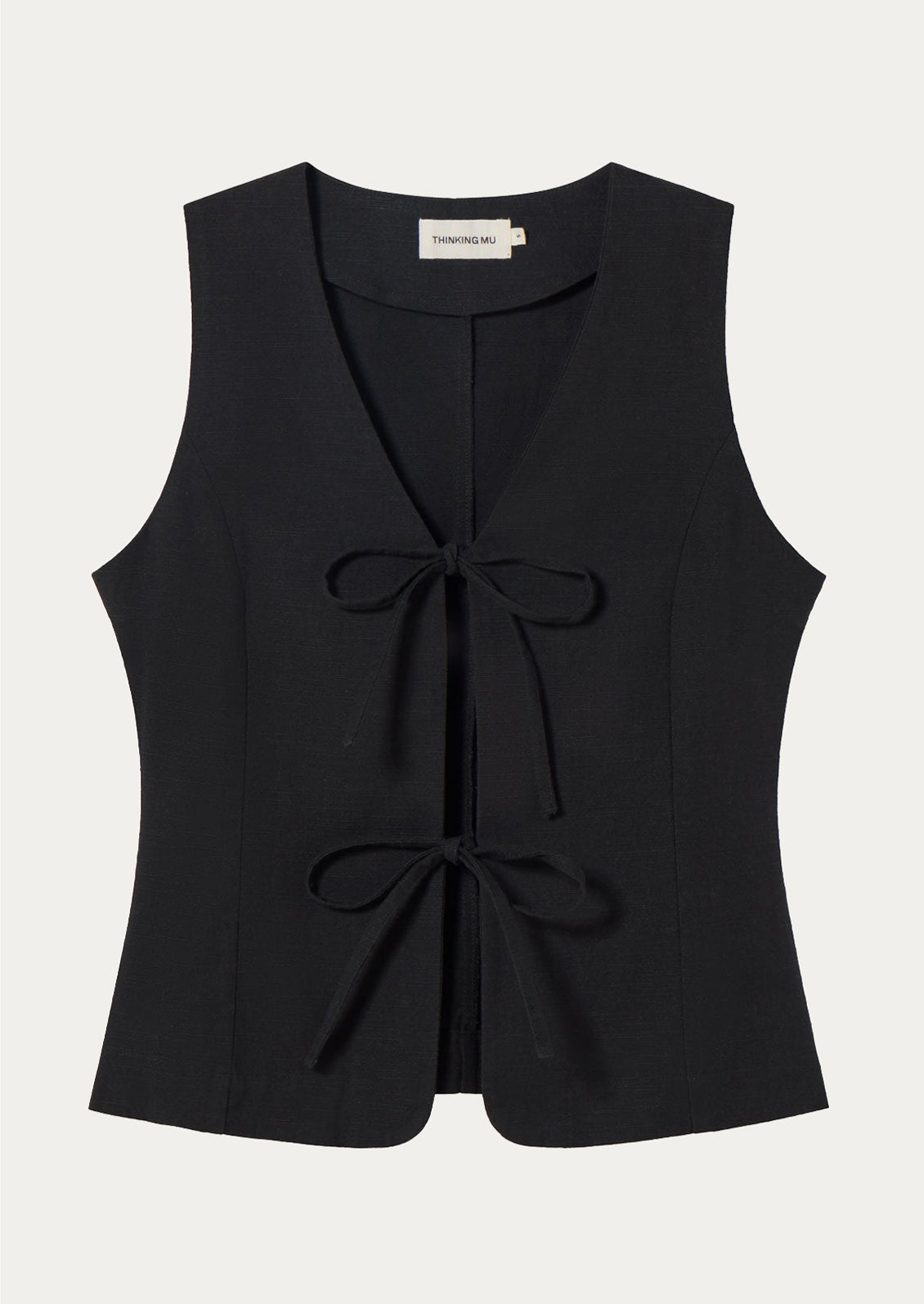 A black sleeveless top with front ties.