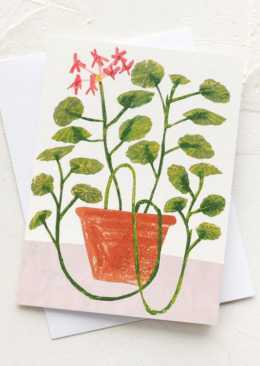 Card with a potted plant illustration on a white background