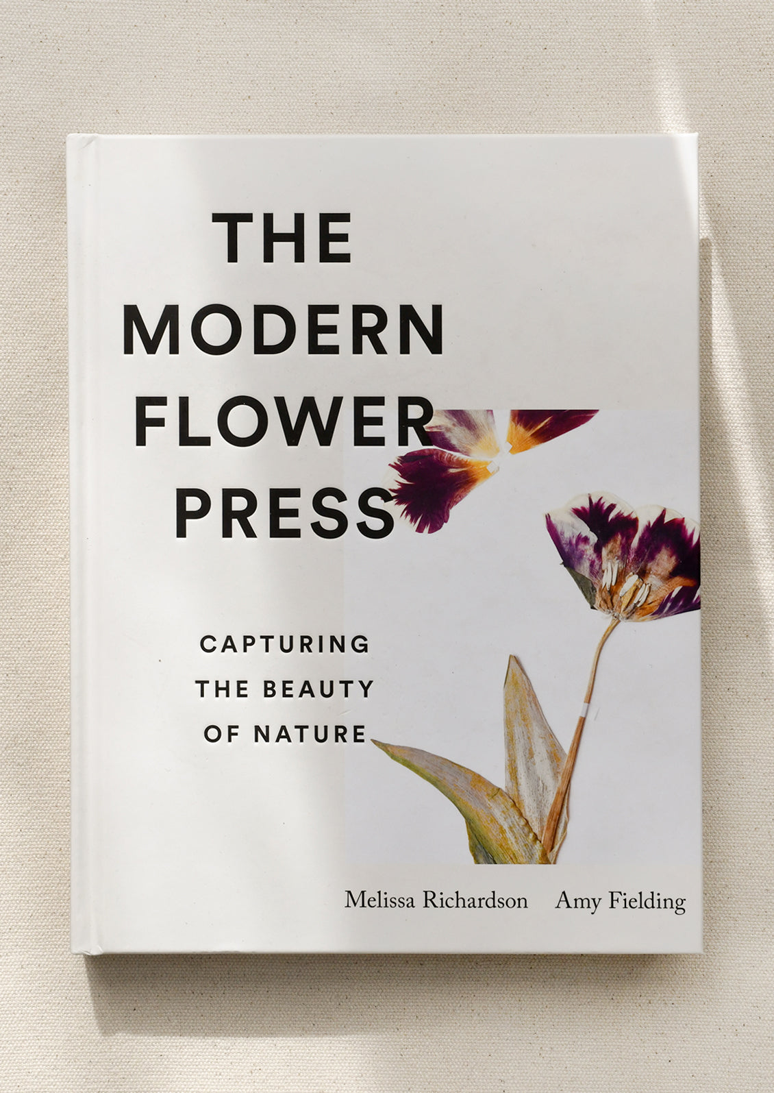 A hardcover book titled "The Modern Flower Press".