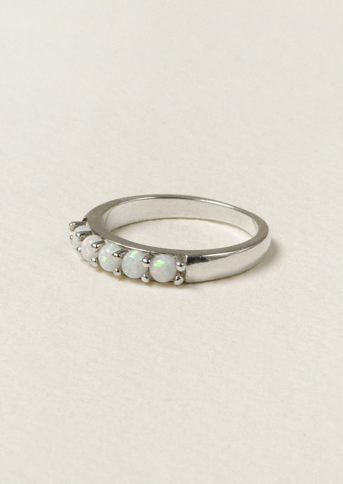 A sterling silver ring adorned with 5 opals.
