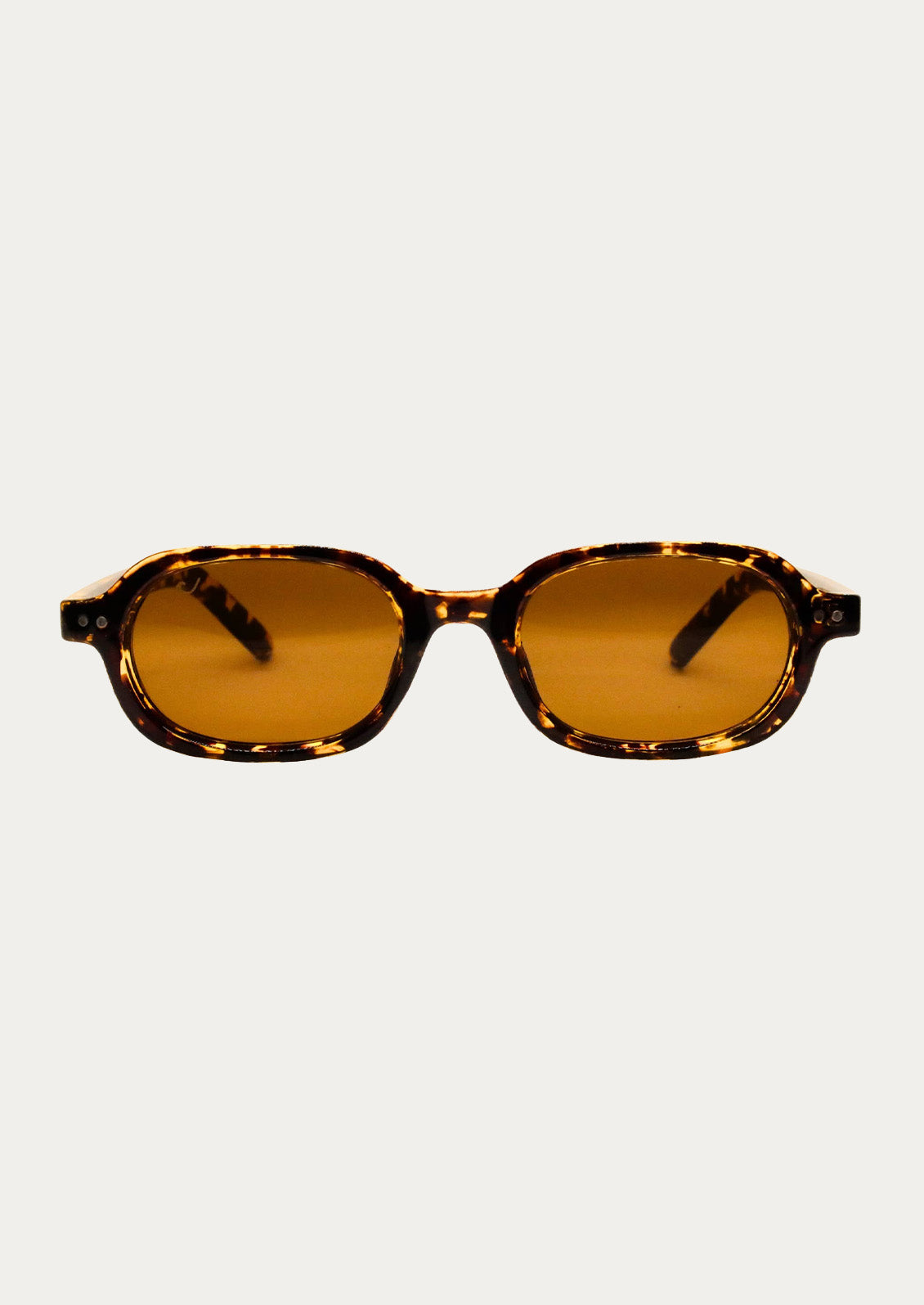 A pair of oval-rectangle sunglasses with a marble tortoise rim and medium brown tinted lenses.