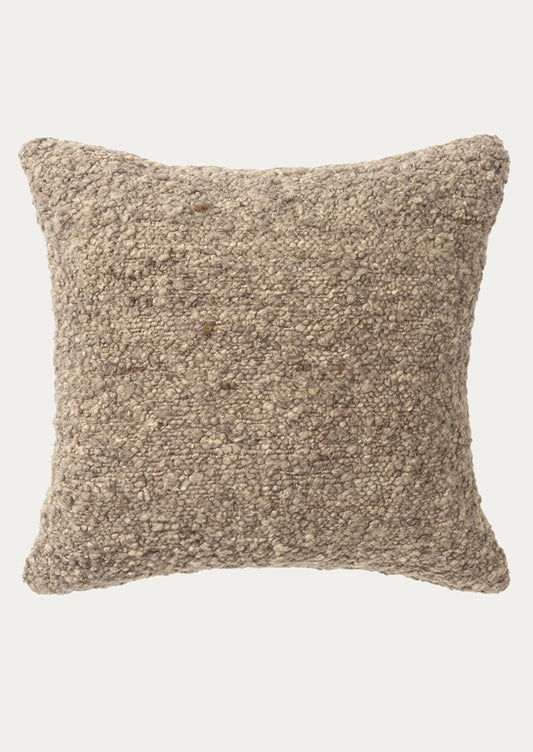 A square throw pillow with a textured, chunky woven boucle fabric in a warm taupe-beige color.