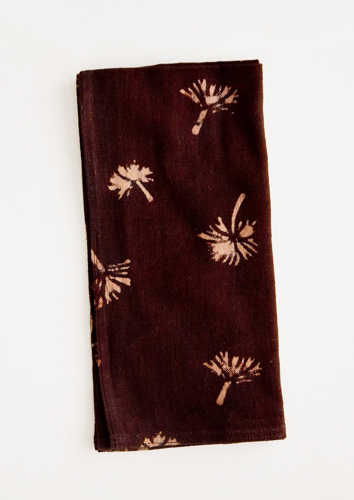Block print cotton dinner napkin in wine with peach dandelion print