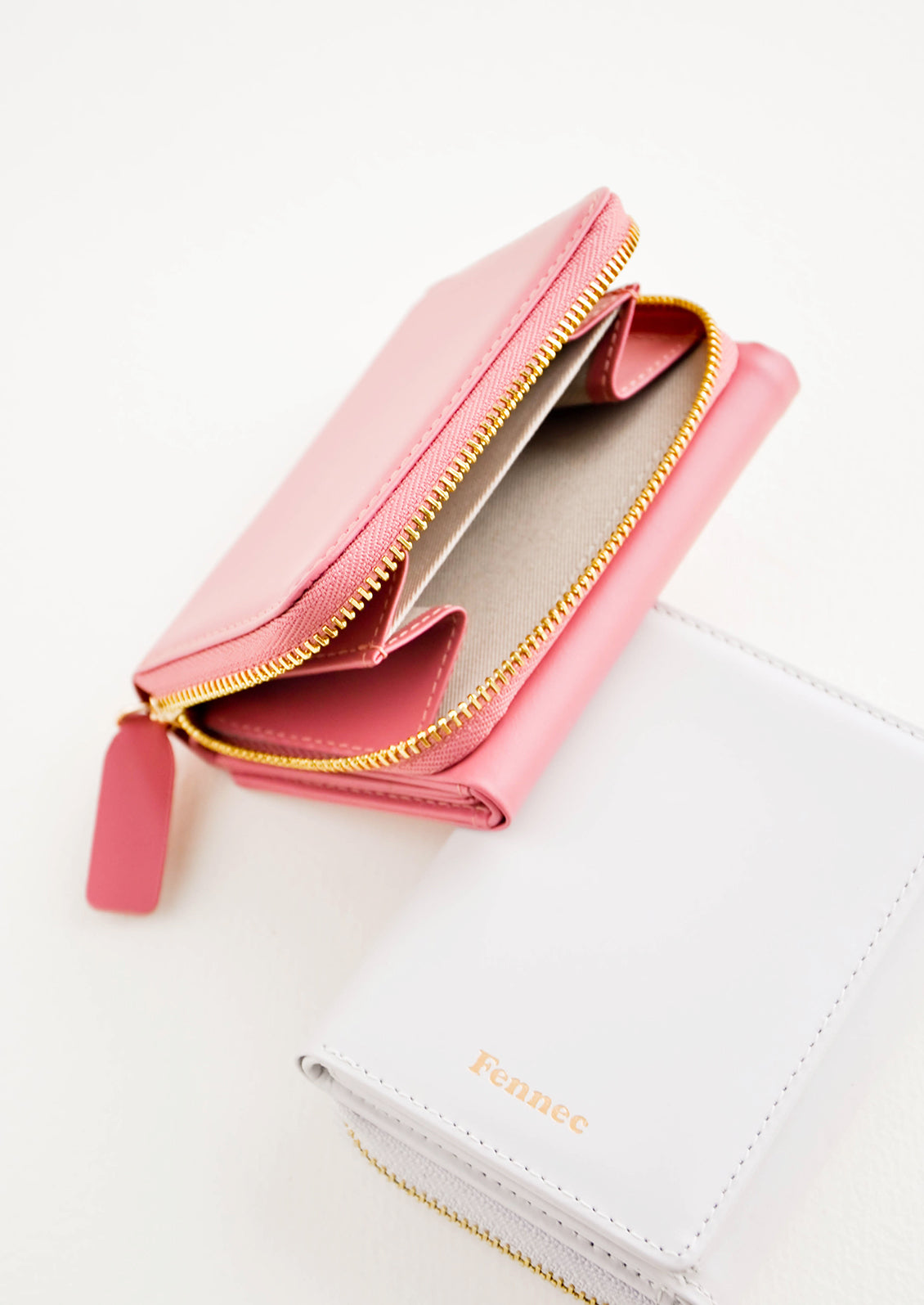 Product shot featuring multiple colors of wallet, showing the inside and outside.
