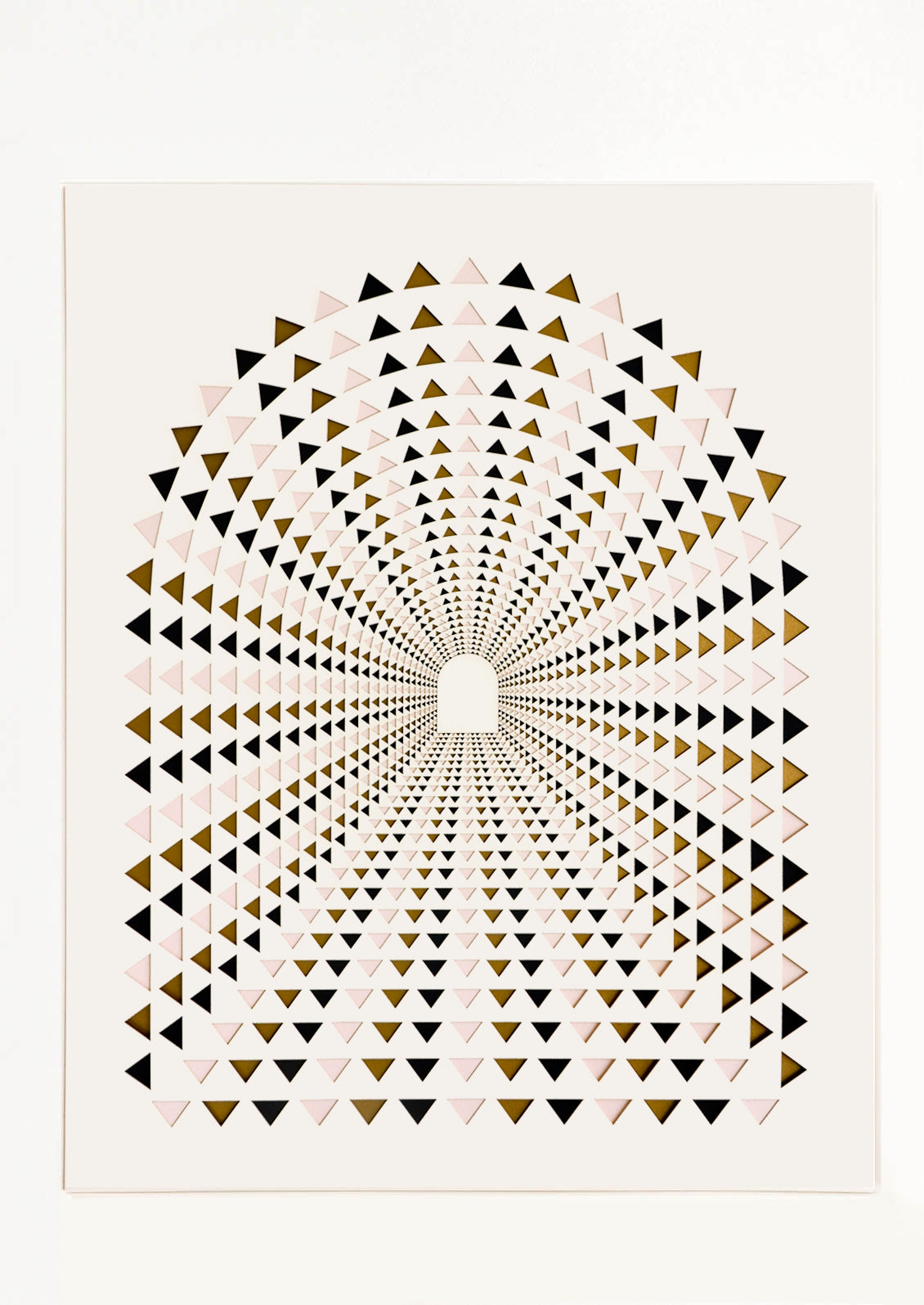 Lasercut artwork featuring arched doorway radiating outwards, made up of triangle shapes 